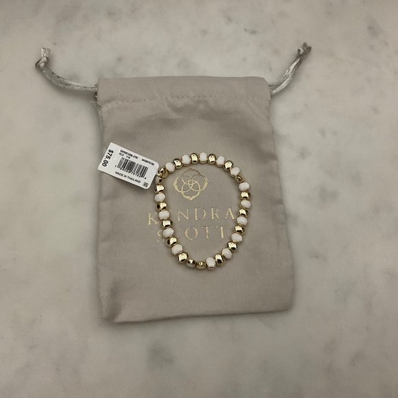 Kendra Scott Daphne Enamel Gold Stretch Bracelet in Gold White Ename - Picture 2 of 2